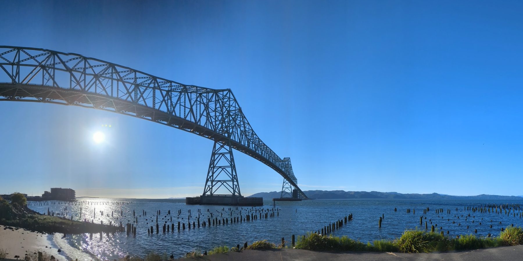 The Astoria-Megler Bridge arching over the Columbia River on a clear day